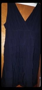 Sleeveless black nite out dress with front ruffles